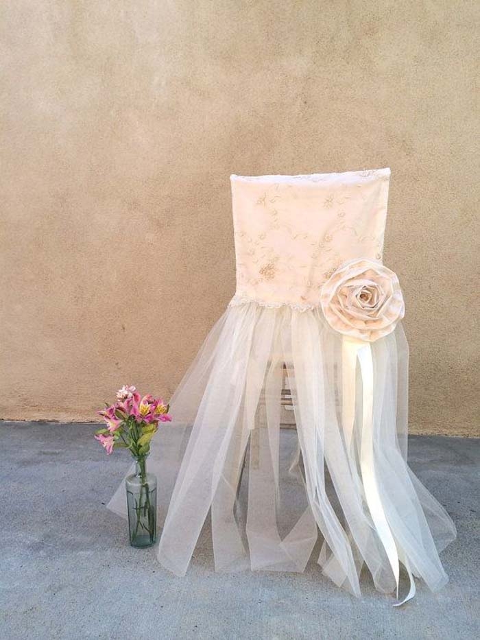 http://www.intimateweddings.com/wp-content/uploads/2015/11/Pink-Flower-Chair-Cover-700x933.jpg