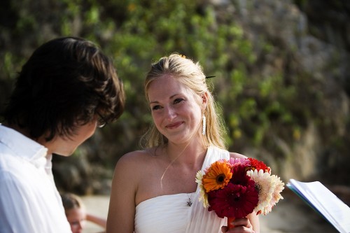 bride on beach in Mexico photo by Kate Harrison