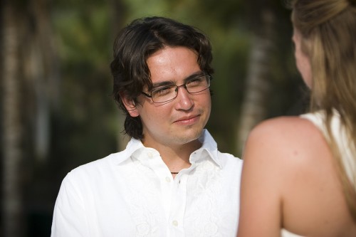 groom on beach photo by Kate Harrison