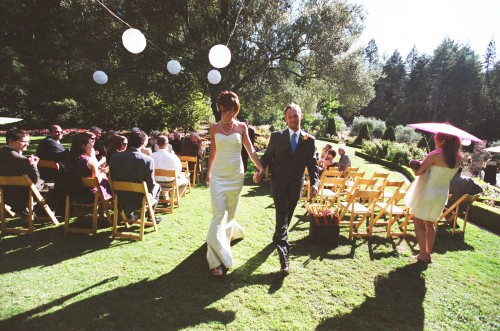 Small wedding ceremony and reception in the front gardens of a gorgeous Tudor estate in the hills above Napa Valley. Photo courtesy of Susan Adler Photography