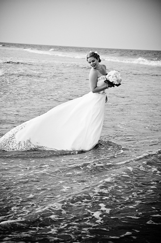 trash the dress in the ocean