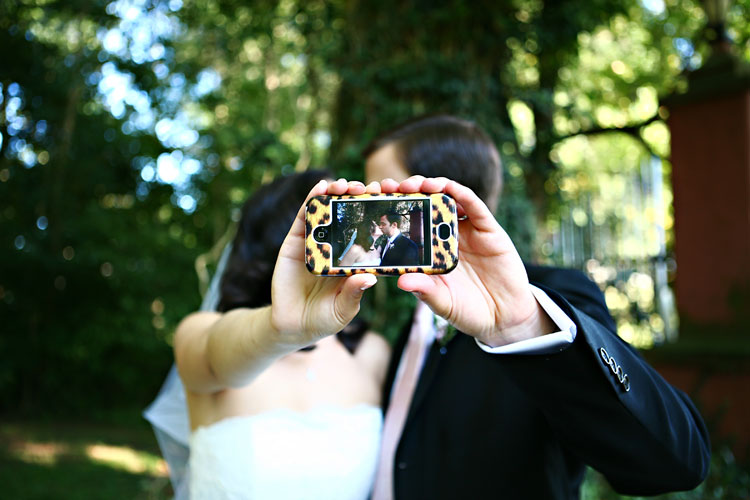 wedding couple with camera