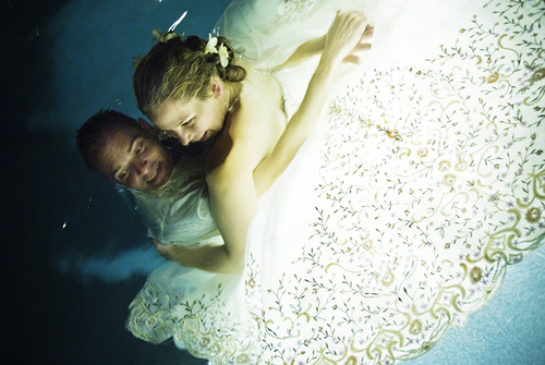 trash the dress in a swimming pool