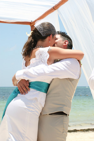 bride and groom kissing