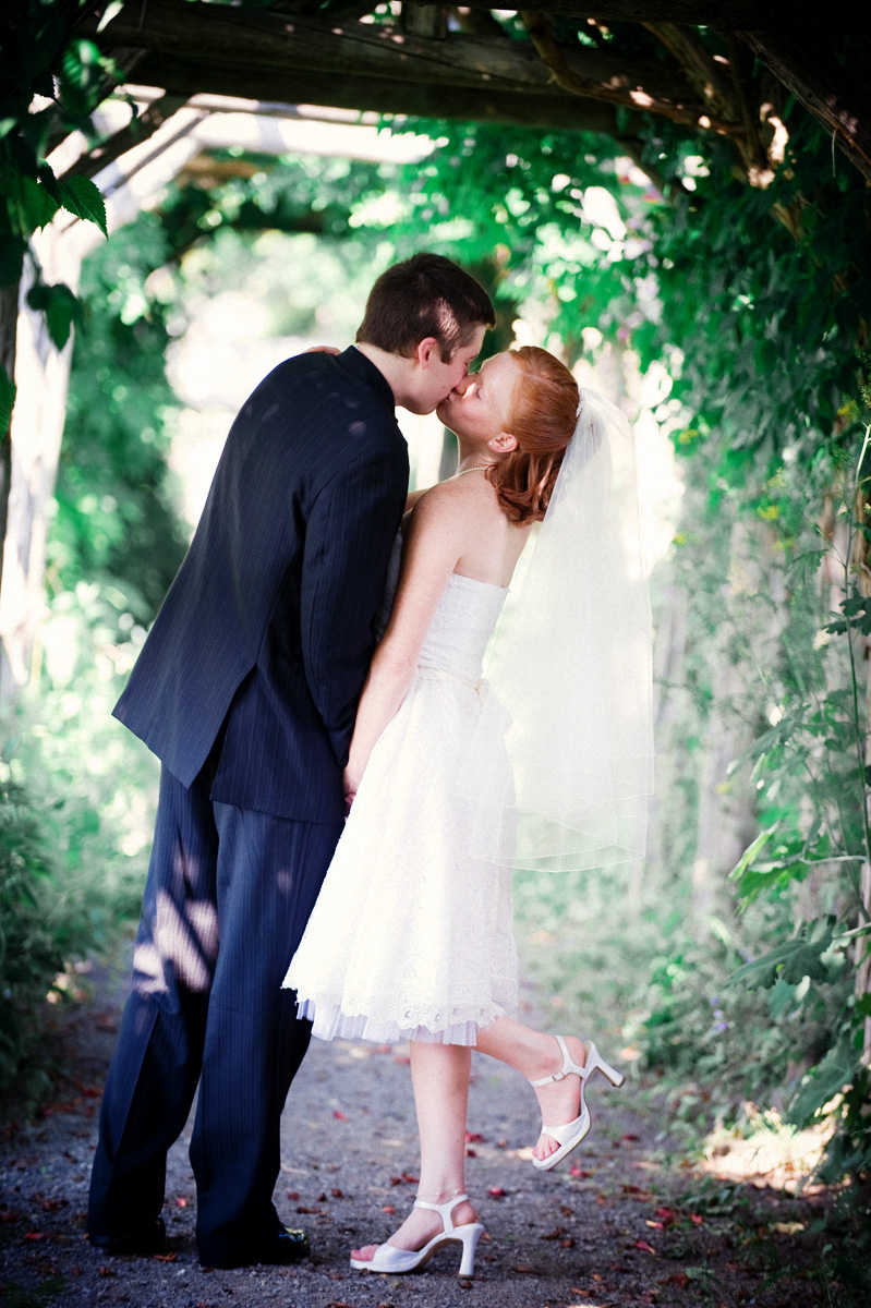 bride and groom kissing