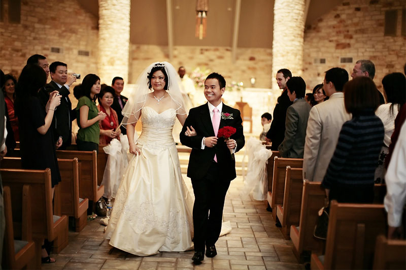 bride and groom walking down the aisle