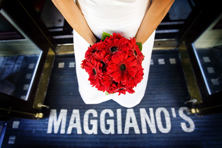 bride with red bouquet
