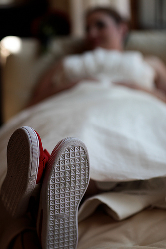 bride with running shoes