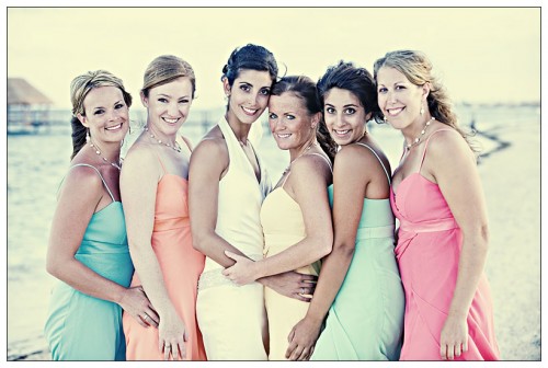 beach wedding bridesmaids in pastel dresses