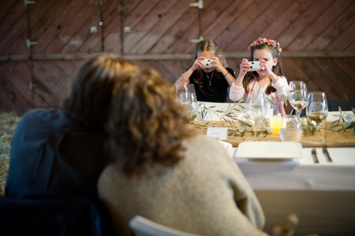 kids taking photos at wedding