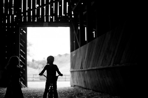 child in barn