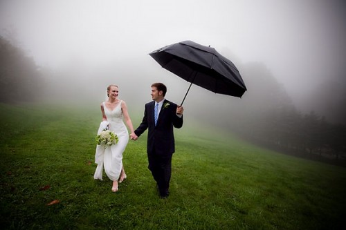 bride and groom in fog