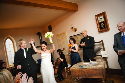 bride and groom at schoolhouse