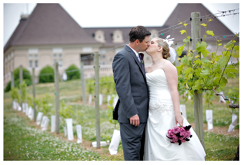 couple kissing wedding