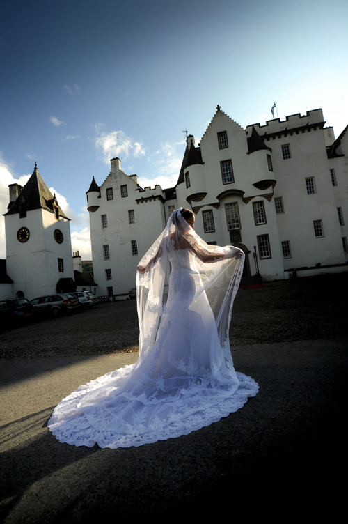 bride in front of blair castle in scotland