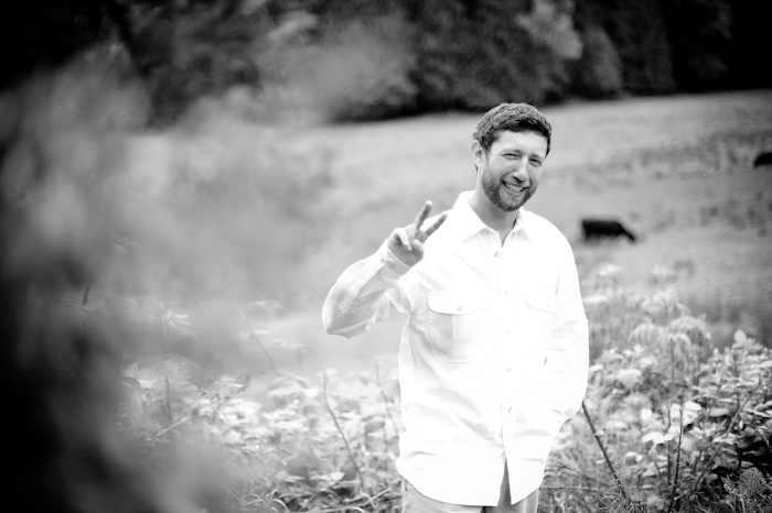 the groom in a field