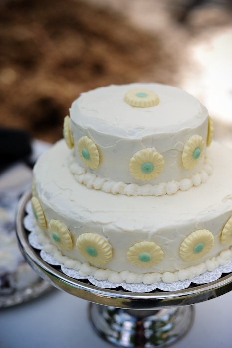 wedding cake with yellow flowers