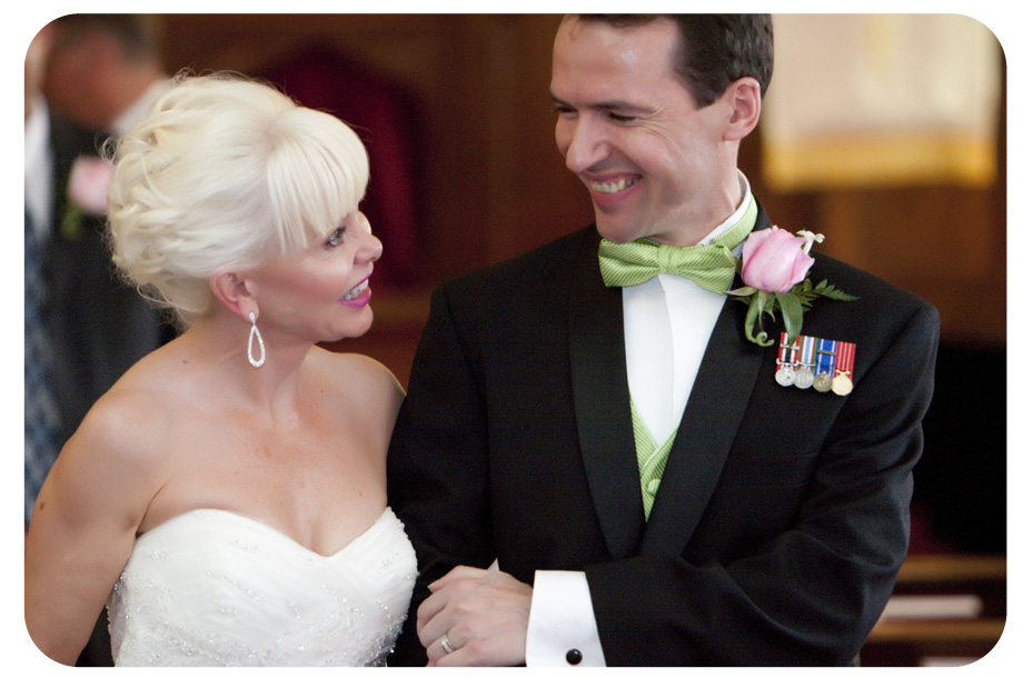 groom wearing green bowtie