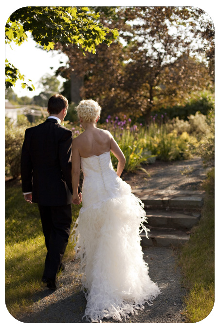 bride and groom on sidewalk