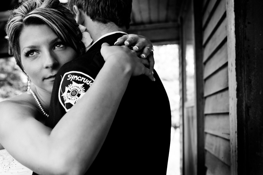 Bride and groom embracing