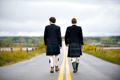 groom and best man wearing kilts