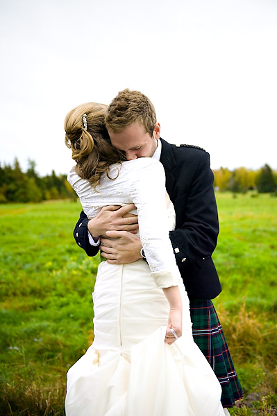 bride and groom embracing