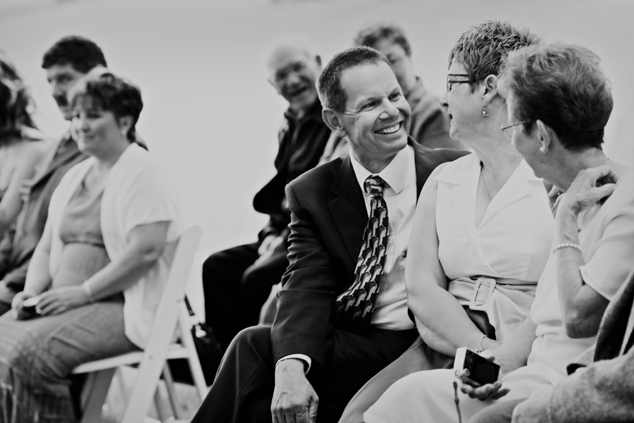 laughing wedding guests