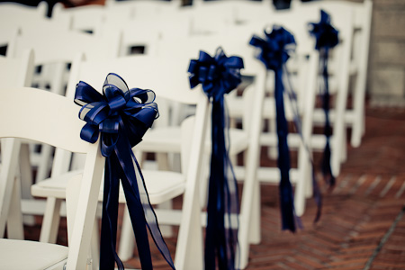 blue ribbon chair decor for wedding ceremony