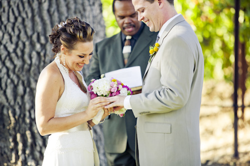 bride and groom exchanging rings