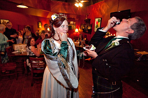 bride and groom eating cake