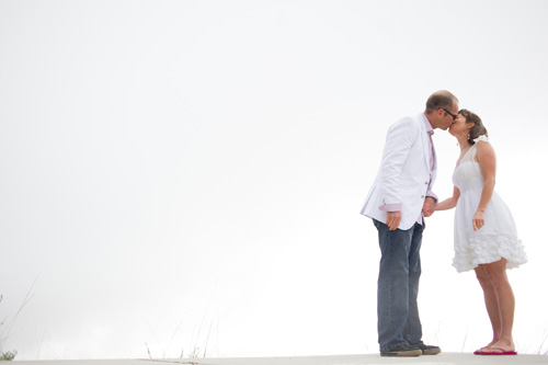 bride and groom kissing