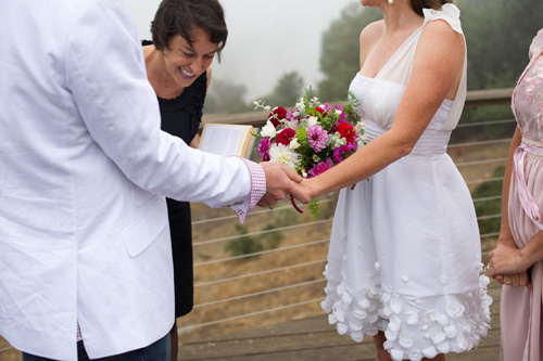 bride and groom exchanging rings