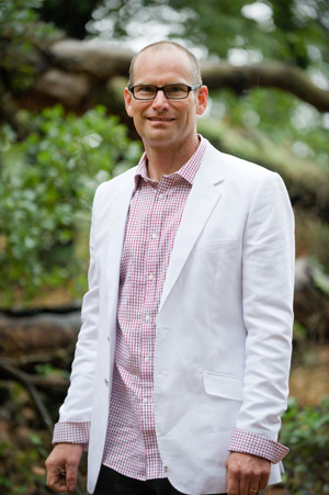 groom wearing white and red checked shirt