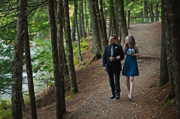 bride and father walking in the woods