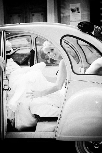 bride in vintage car