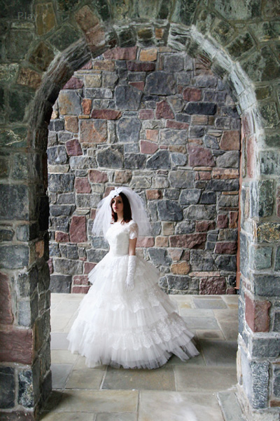 Bride under arbor