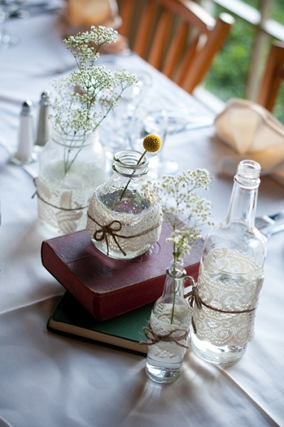 baby's breath in lace wrapped jars 