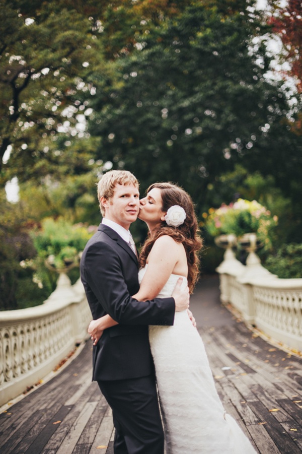 bride and groom kissing in Central Park