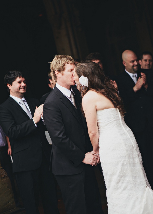 bride and groom first kiss in Central Park