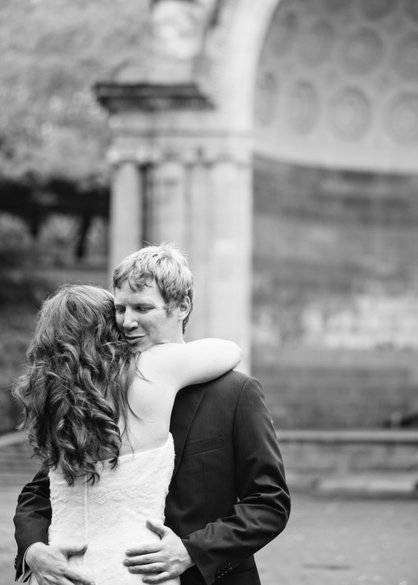 bride and groom hugging