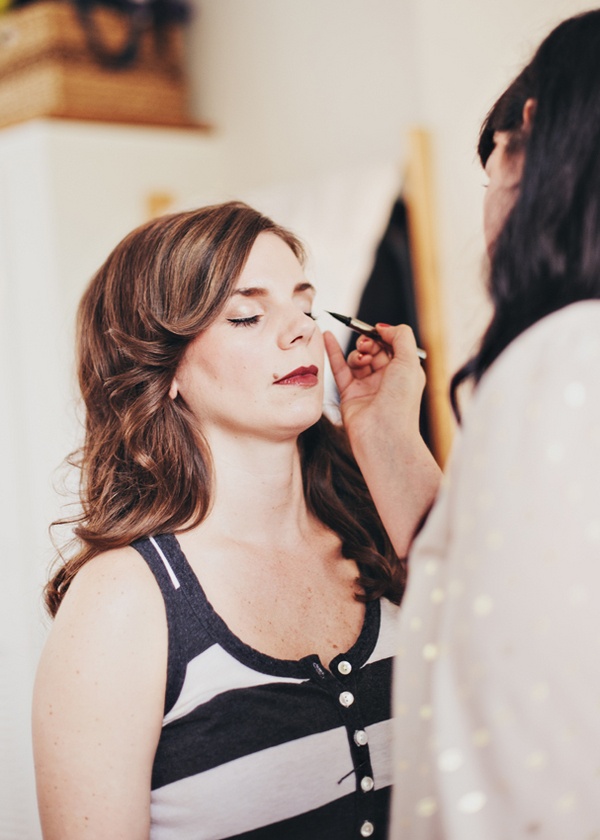 bride getting her make-up done