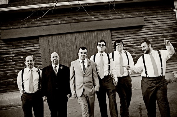 groomsmen portrait in front of barn