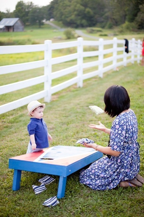 farm-wedding-guests-children-games-cornhole