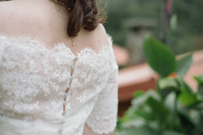 Lace dress with crystal buttons