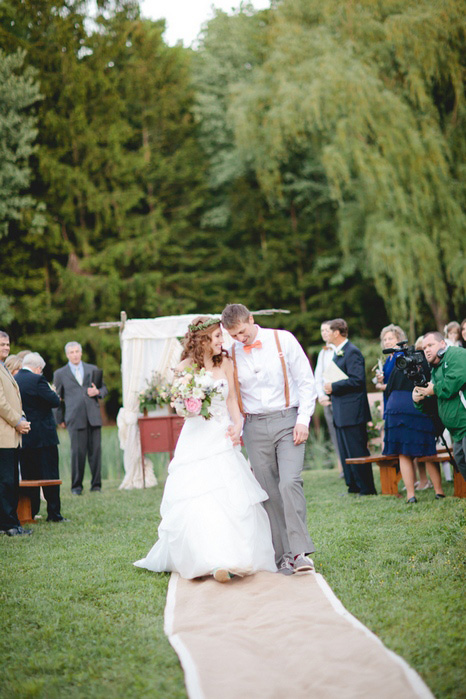 bride and groom walking down aisle