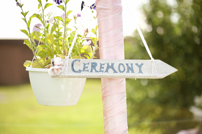 Wooden wedding ceremony sign