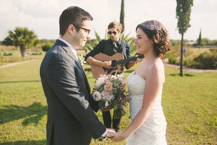 officiant playing the guitar during elopement ceremony