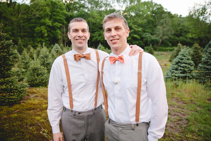 orange bow tied groom and best man