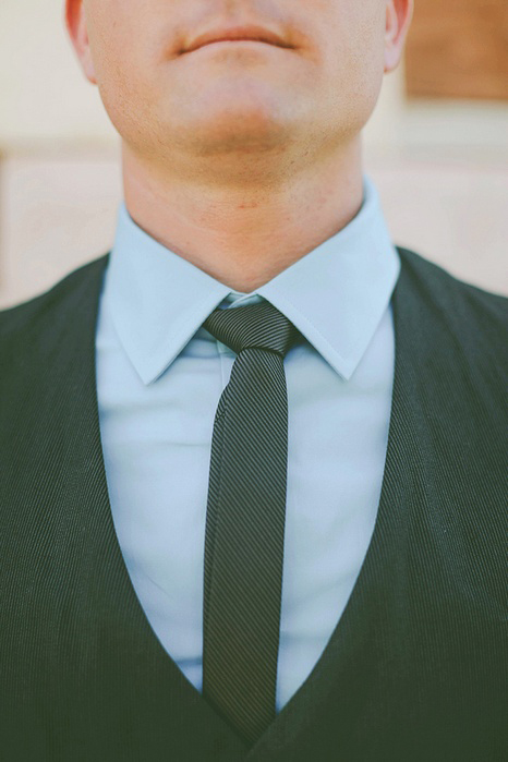 groom in black tie