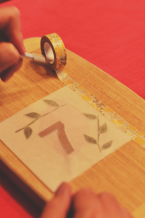 diy table numbers with waxed paper - tape panels together with washi tape